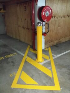 safety bollards installation qld and nsw and linemarking in car park