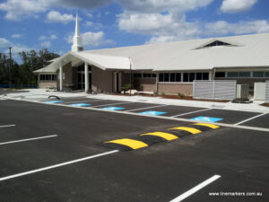 car park. bay line marking qld nsw with speed hump installation